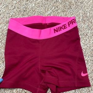 maroon with pink detailing & band NIKE pros